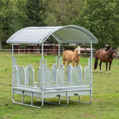 Feeder with roof and covered tombstone railings for horses